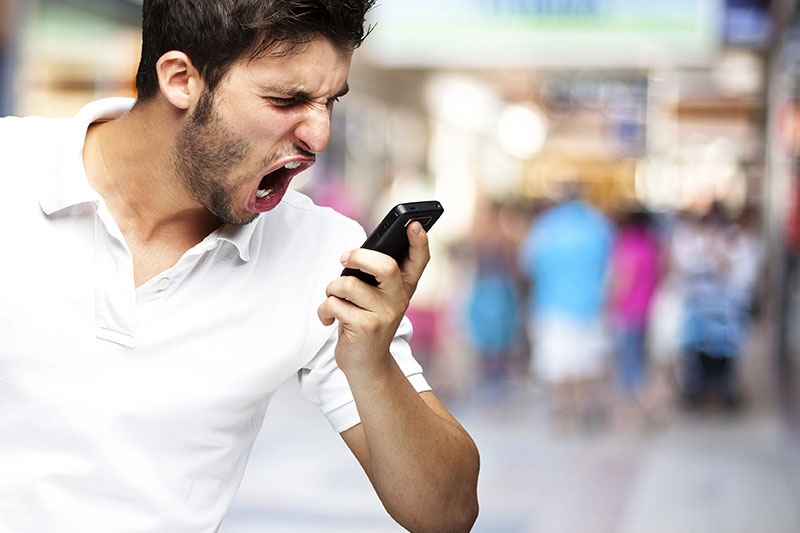 Man yelling at his phone