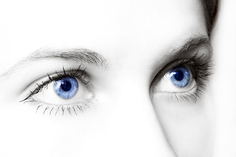 Woman's eyes looking upward, representing hope